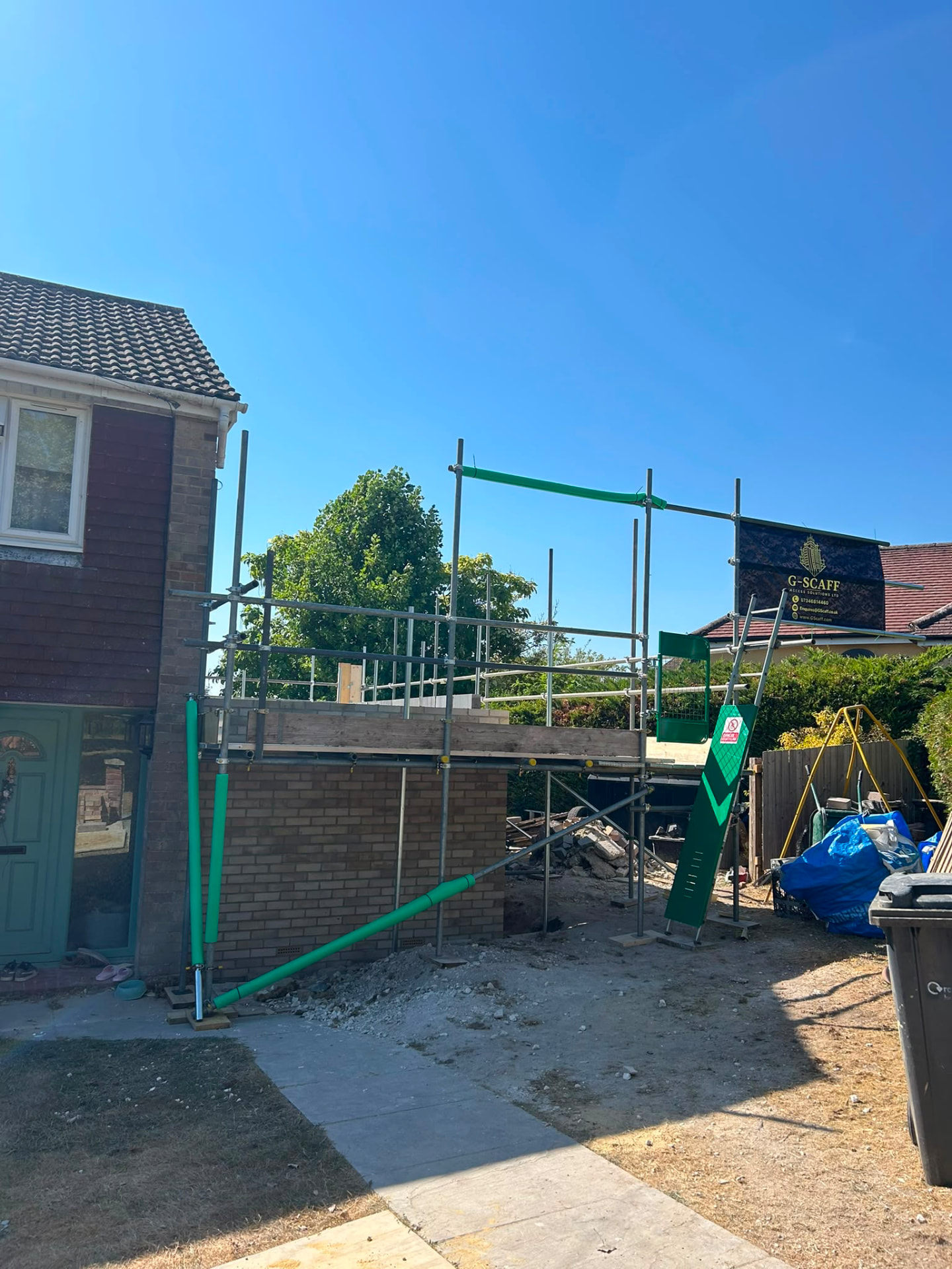 Rear extension scaffold with loading bay, Hampshire